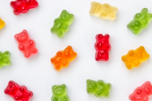 Colourful jelly candy gummy bears on white background